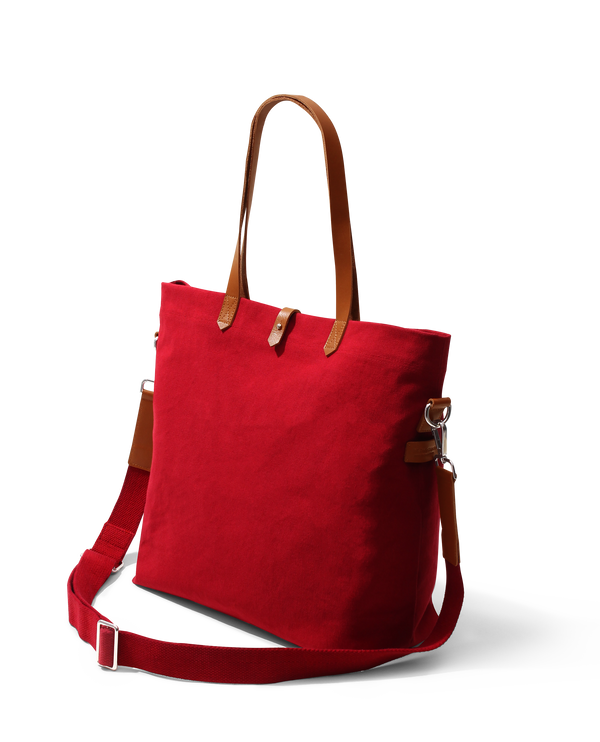 https://www.dailyobjects.us/cdn/shop/products/DailyObjects-Red-Buoyant-Tote-Bag_bf89d2f3-4aab-4a95-a39e-7f89a9aa8015_600x.png?v=1699254976